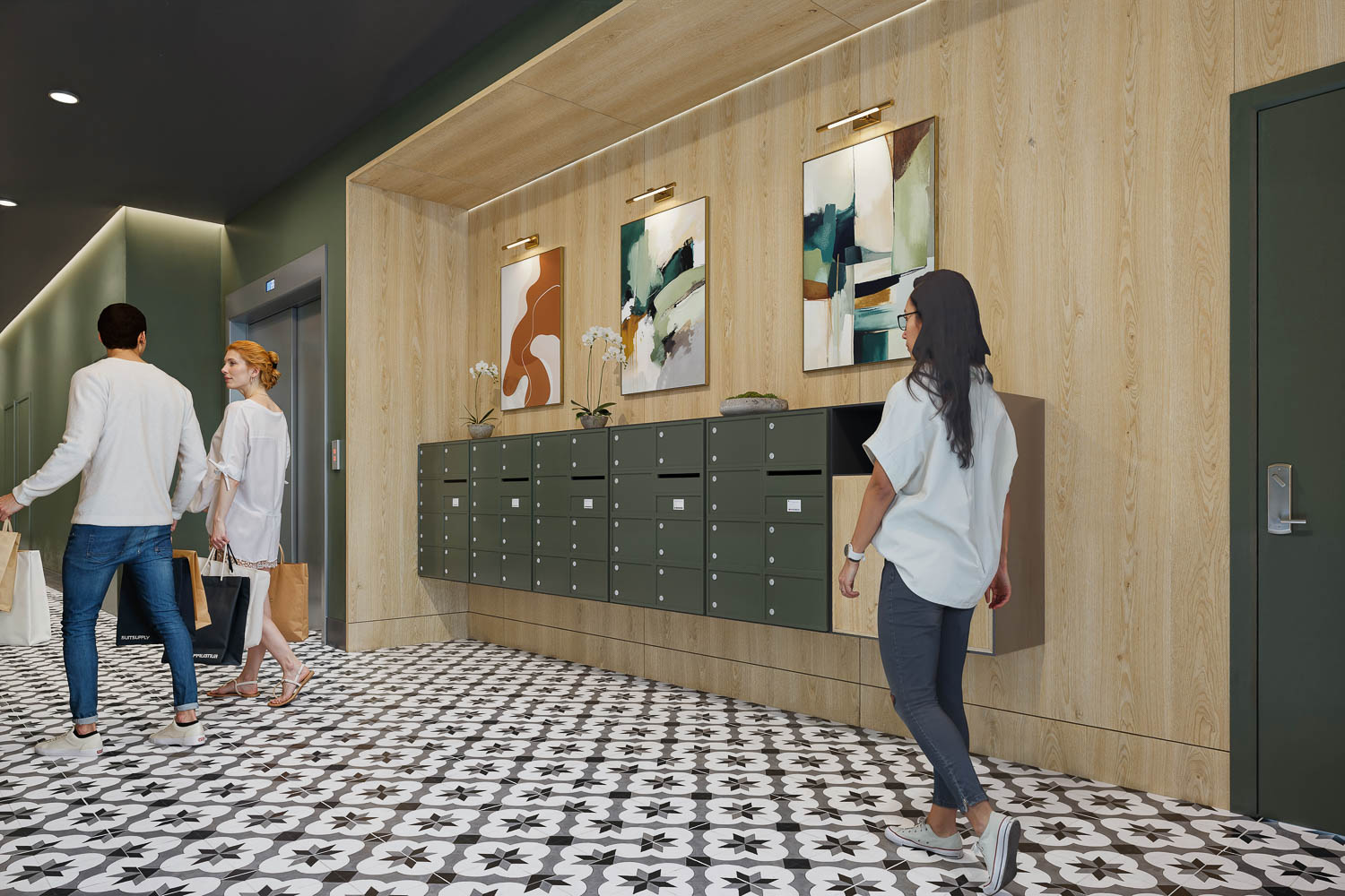 Residents walking through the lobby and mailroom at The George